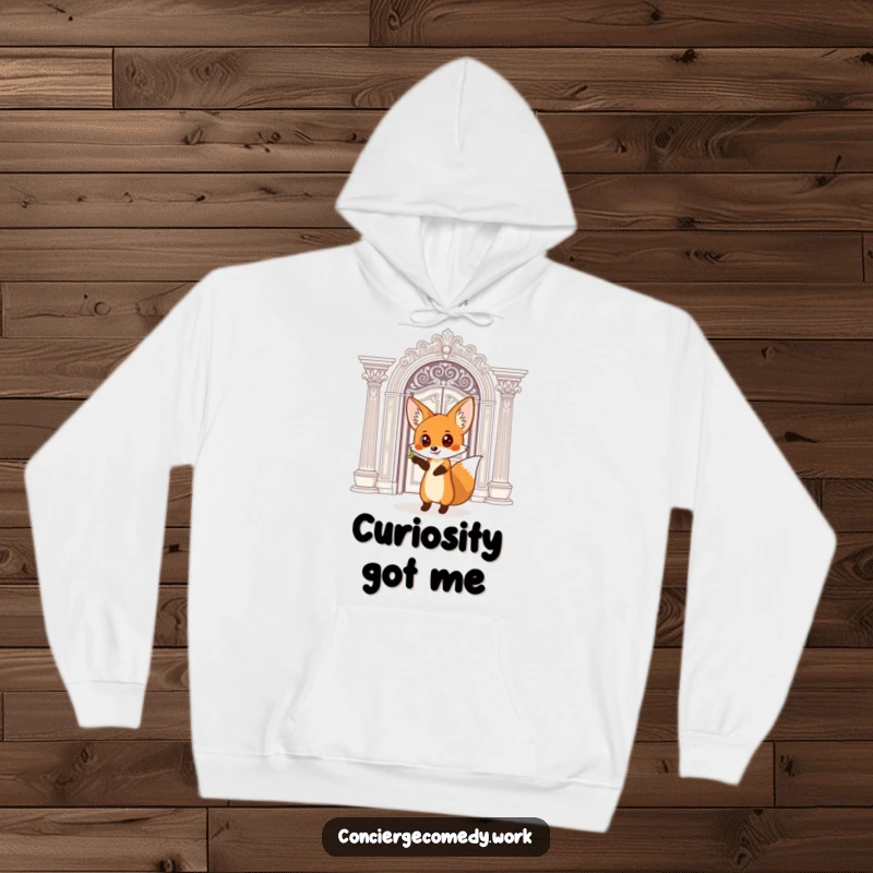 Funny Hoodie: A curious fox with wide eyes points towards a grand, ornate doorway, inviting curiosity.